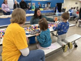 Children building with blocks at Little Explorers STEAM Night