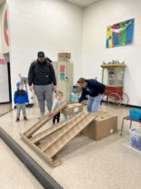 Children exploring together at Little Explorers STEAM Night