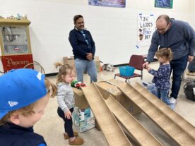 Children investigating sinking and floating with Livingston County 4-H