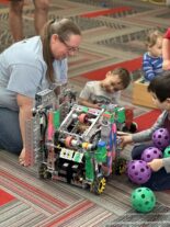 Young children exploring movement at Little Explorers STEAM Night