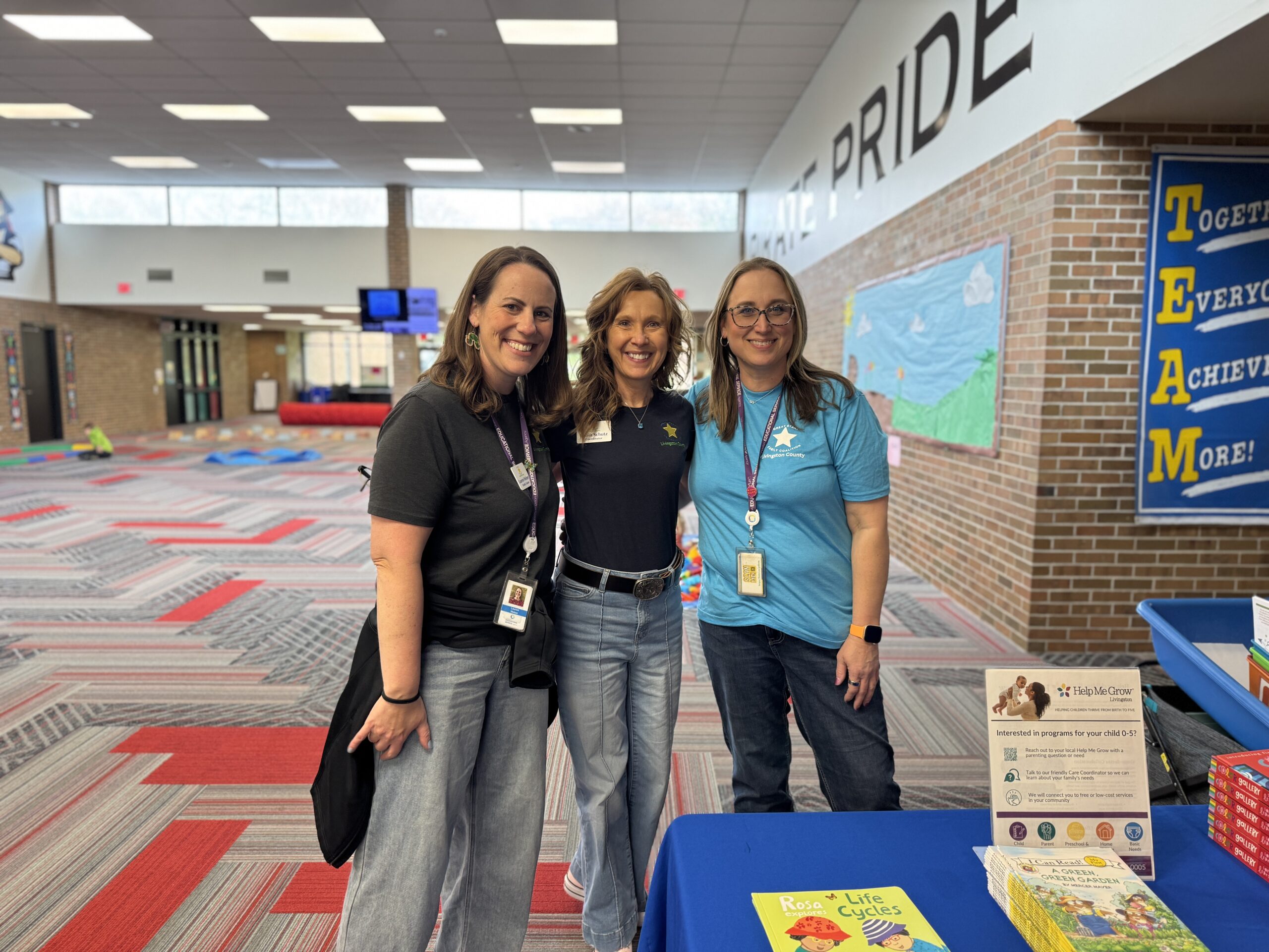 Community partner hosting a hands-on activity for young children