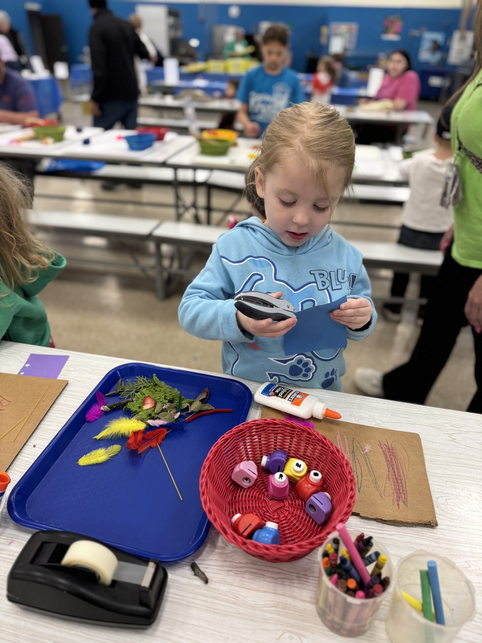 Child exploring an early learning activity at Little Explorers STEAM Night