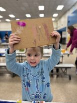 Families gathered at Little Explorers STEAM Night