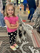 Young child investigating during Little Explorers STEAM Night