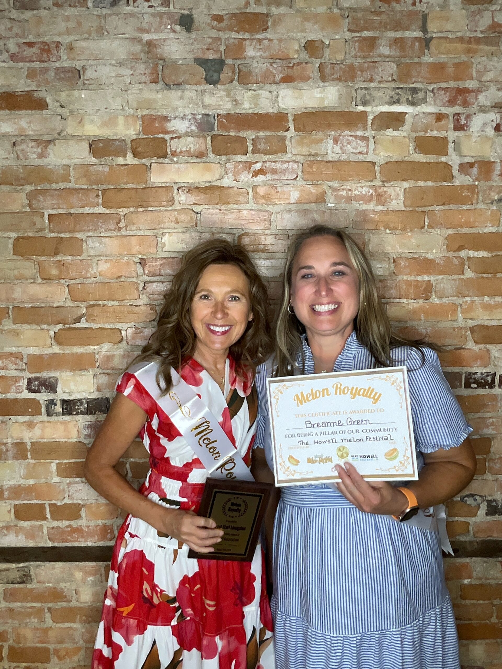Breanne Green and Robin Schutz of Great Start Livingston display their awards at the 2026 Howell Melon Social.