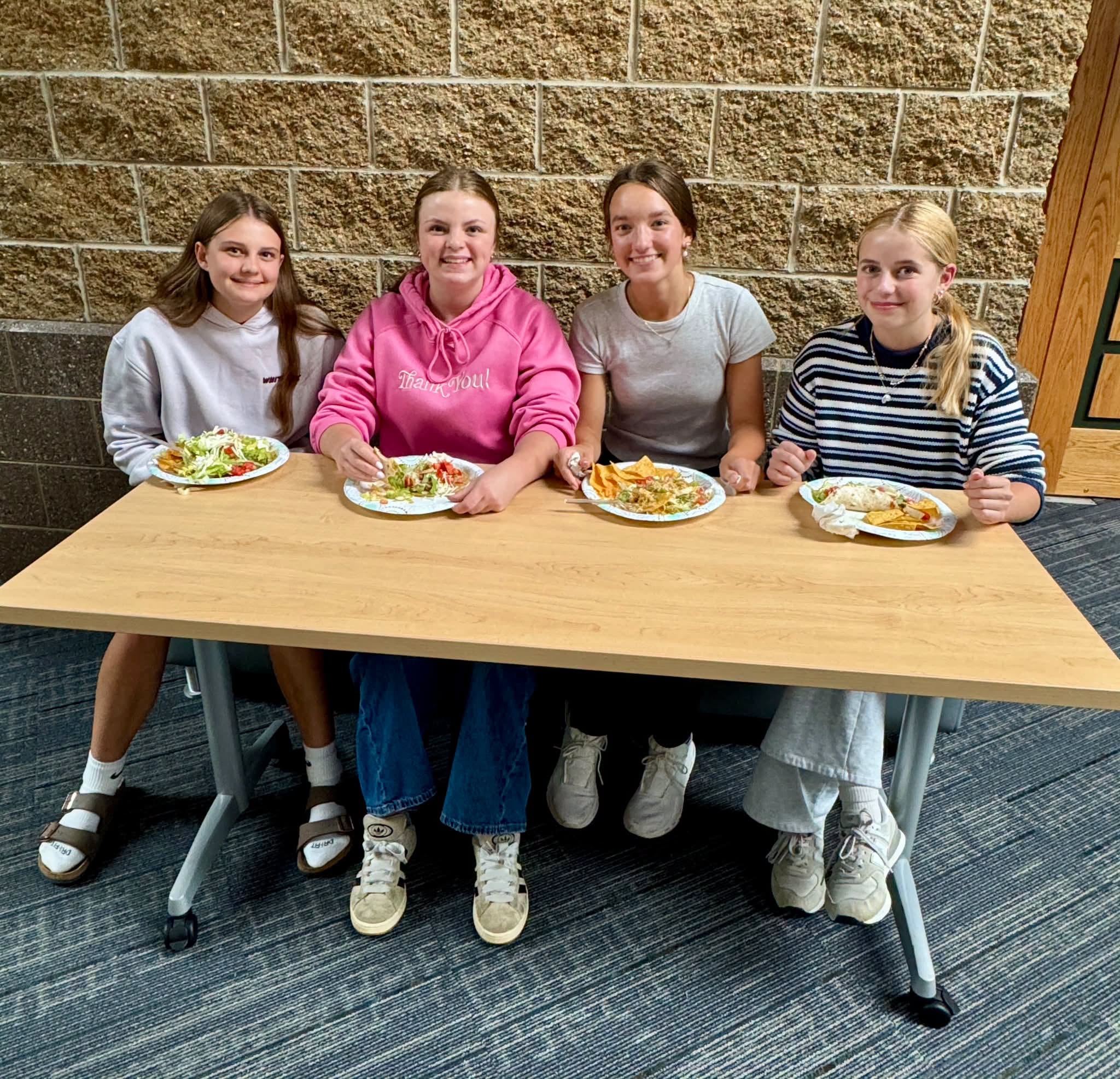 Teen childcare workers helping families during the Great Start Livingston parent workshop in Howell Michigan